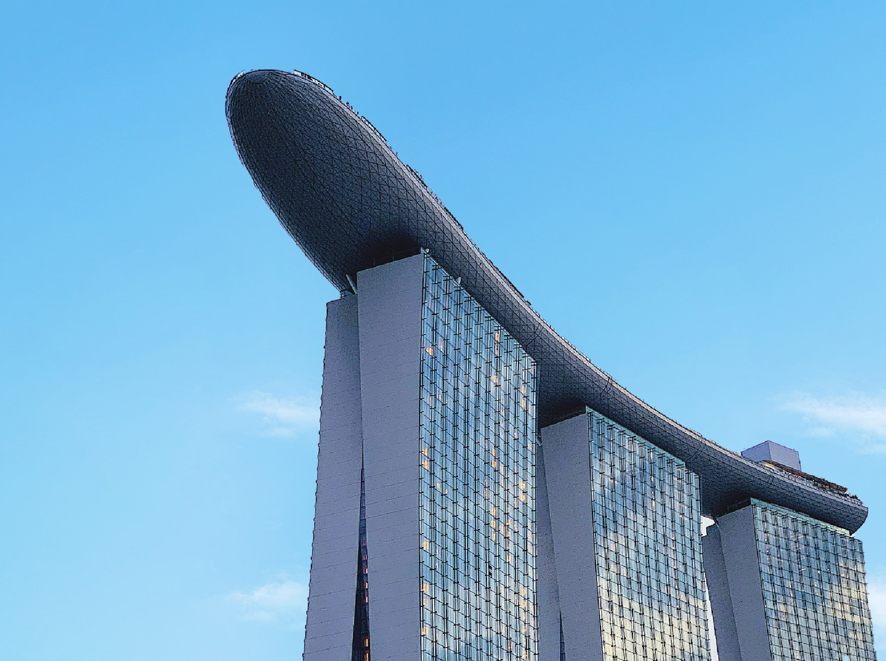 Iconic Marina Bay Sands with unitised glass curtain wall system, showcasing BIM-based curtain wall design.